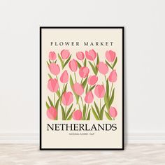 a poster with pink tulips in the foreground reads flower market netherlands