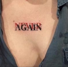 a woman with a tattoo on her chest that says, againn in red ink