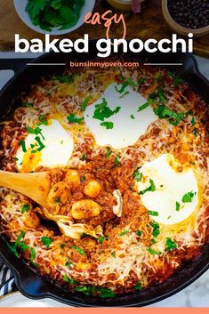 baked gnocchini in a skillet with parsley on top