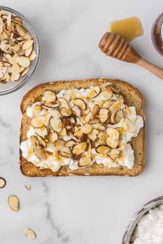 toasted bread topped with whipped cream and nuts