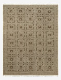 a beige and brown rug with square shapes on the bottom, surrounded by smaller squares