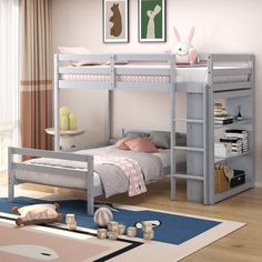 a white bunk bed sitting on top of a wooden floor