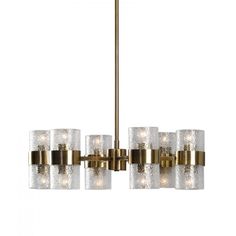 a brass chandelier with frosted glass shades