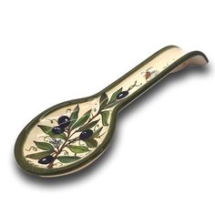 a ceramic spoon with olives painted on the side and green leaves in the middle