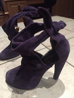 These are a Beautiful pair of Booties from TASHKENT.  They are a deep, rich Purple Suede in size 37.  I wore them one time, honest.  I have a problem with buying shoes..way too many, they never got worn.  Now I need to sell a lot of them sadly.  These are in awesome condition, they do not come with a box however. The style is Collette.  They tie in the back and have great cutouts on the sides so they're really more than just a bootie.  They have a shiny gold interior.  The heel is 4 inches.  Rea Buying Shoes, Rich Purple, Gold Interior, Purple Suede, Buy Shoes, Mississippi, Nice Shoes, Bootie, Things To Sell