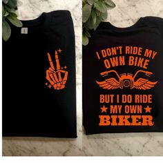 two t - shirts that say i don't ride my own bike but i do ride my own biker