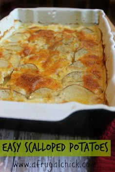 a casserole dish with potatoes is shown in a white baking dish on a wooden table