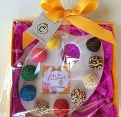 an assortment of donuts in a gift box