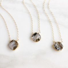 Dendrite Opal Gemstone Slice Necklace. Dainty Gemstone Necklaces Gold. Gemstone Layering Necklace.So sweet and dainty, these necklaces are the perfect item to add to your jewelry collection!  They can be layered, or worn alone. They can be dressed up and dressed down!  The stones vary in size from 15mm-20mm.    The chain is delicate yet sturdy 14k gold filled chain.  The necklaces close with a lobster clasp.Please note that you will not receive the exact stone pictured.  No two stones are the sa Dainty Gemstone Necklace, Dendrite Opal, Crescent Necklace, Necklaces Gold, Gemstone Necklaces, Layering Necklace, Necklace Dainty, Gems Jewelry, Gold Filled Chain