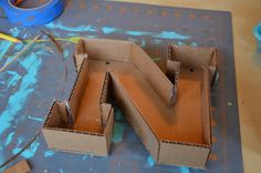 some cardboard boxes sitting on top of a table