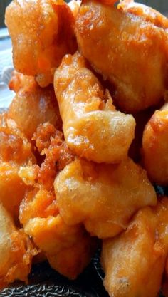 some fried food is sitting on a plate