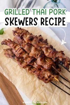 grilled thai pork skewers with text overlay that reads grilled thai pork skewers recipe