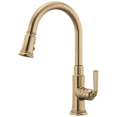 a kitchen faucet with the pull out sprayer and brass finish on an isolated white background