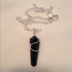 - Handmade Breathtaking And Unique, Genuine Black Obsidian Spear Tip Necklace Pendant With Silver Wiring. Chain Included. - Look Through My Closet For The Set With Earrings Included Or For Separate Earrings If You Are Interested - Ships Same Day If Possible Black Wire Wrapped Pendant Crystal Necklaces, Black Wire Wrapped Crystal Pendant Necklace, Black Wire Wrapped Spiritual Crystal Necklace, Obsidian Necklace, Black Obsidian, Crystal Pendant, Gemstone Necklace, Black Silver, Womens Jewelry Necklace