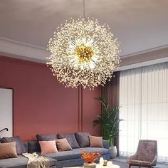 a living room filled with furniture and a large chandelier hanging from the ceiling