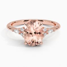 an oval morganite and diamond ring in rose gold