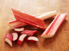 sliced up radishes sitting on top of a wooden table