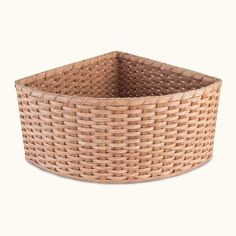 an empty wicker basket on a white background