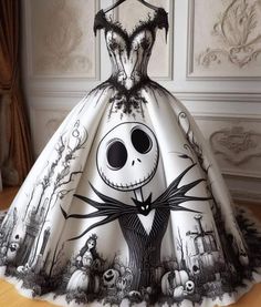 the dress is decorated with black and white designs, including a skeleton face on it