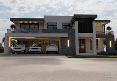 two cars parked in front of a modern house