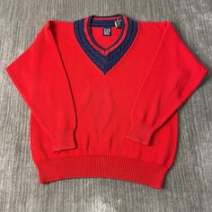 Vintage 2000s Gap Basic Essential Streetwear Causal Preppy Style Y2K Aesthetic Red Pullover V Neck Knit Sweater Extra Large Mens Condition:  Excellent Used Condition  = No Flaws Measurements: Please see photos above for all measurements IF YOU BUY TWO OR MORE ITEMS USE THE CODE BUNDLE @ CHECK TO SAVE 20% WE SHIP WITHIN 24 HOURS AFTER PURCHASE! Please be aware that we do not offer free returns!! The Buyer is responsible for the cost of the return label.  Follow us on TikTok & Instagram @findsnost Y2k V-neck Sweater For Fall, Casual Red Sweater With Ribbed Cuffs, Red Sweater For Fall Streetwear, Y2k Style V-neck Sweater For Fall, Y2k V-neck Fall Sweater, Classic Red Sweater With Ribbed Collar, Red Long Sleeve Polo Sweater For Winter, Classic Red V-neck Sweater For Winter, Red Retro Sweater For Streetwear