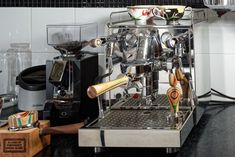 an espresso machine sitting on top of a counter