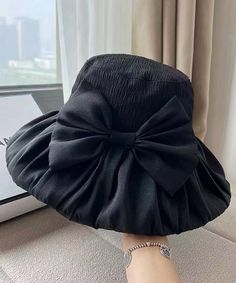 Korean Black Version Bow Bucket Hat Spring SummerMade of fine Silk blended.Hat Circumference: 58cm/22.62". Matches easily with daily hairstyle, dresses & Shirts Black Brimmed Hat With Bow, Black Hat With Bow And Curved Brim, Black Cloche Hat For Party, Black Summer Party Hat, Elegant Black Cloche Hat For The Beach, Elegant Black Cloche Hat For Beach, Kentucky Derby Black Hat With Bow, Black Short Brim Bucket Hat For Spring, Chic Party Hat In Solid Color