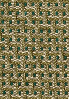 a green and white woven material with small squares on the side, in an abstract pattern