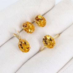 Citrine November Birthstone Jewelry Set, 14k Solid Yellow Gold Jewellery Set, Citrine Necklace, Citrine Earrings, Citrine Ring, Fine Jewelry Product Details > Gemstone - Natural Citrine > Materials - 14K Solid Yellow Gold > Gemstone Shape - Oval > Earring Size : 9x7 mm Approx > Pendant Size : 16.5x7.5 mm approx > Ring Size - All size available > Gemstone weight - 7.31 carats approx > Gross Weight - 5.050 grams approx > Setting type - prong setting # Ring size - all sizes are available, you can u Citrine Jewelry Set, Star Sapphire Jewelry, Gold Jewellery Set, Sapphire Jewelry Set, November Birthstone Jewelry, Sapphire Diamond Pendant, Citrine Jewelry, Citrine Pendant, Citrine Earrings