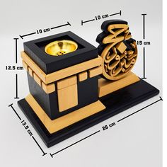 a small shrine with a gold ring in it's center and measurements on the side