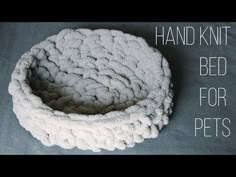 a knitted bed for pets with the words hand knit bed for pets on it