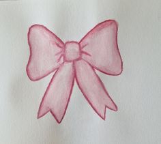 a drawing of a pink bow on white paper