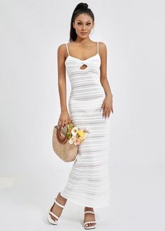 Expertly crafted for comfort and style, our Striped Knitted Cami Maxi Dress is a must-have addition to any wardrobe. With its timeless striped pattern and lightweight fabric, this dress is perfect for any occasion. Its classic white color adds a touch of elegance, making it a versatile and chic choice for any fashion-forward individual. Fabric: High Stretch Material: Polyester Fiber Elegant White Knit Midi Dress, Chic White Ribbed Midi Dress, Chic White Ribbed Dress, White Knit Beach Dress, Spring White Ribbed Midi Dress, Chic Ribbed Maxi Dress For Summer, Chic White Knit Midi Dress, White Ribbed Knit Dress, White Ribbed Midi Dress For Spring