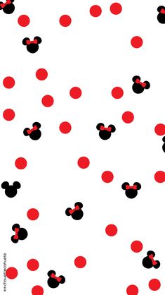 red and black mickey mouse heads on a white background with polka dot circles in the middle