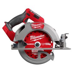 a red and gray milwaukee circular saw on a white background with clipping for text