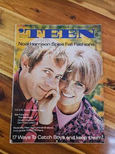 a magazine with an image of two people on the cover