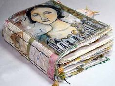 a stack of folded newspapers with an image of a woman's face on them