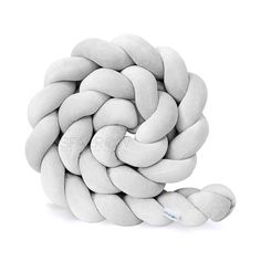 a bunch of white round objects sitting on top of each other in front of a white background