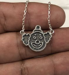 Hi This is a hand made clown necklace, antique oxidate finish. The chain is 16 inches long, rolo diamond cut, 1.5 mm wide. Clown Necklace, Necklace Antique, Silver 925 Necklace, Diamond Cut, Dog Tag Necklace, Necklace Etsy, Diamond Cuts, 925 Silver, Hand Made