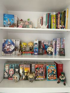 a book shelf filled with anime books and figurines on top of each shelf