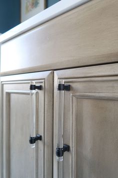 an image of a kitchen cabinet door handles