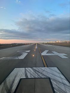 an airplane that is sitting on the runway