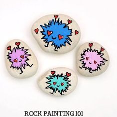 three painted rocks with hearts and spiky designs on them, sitting next to the words rock painting 101