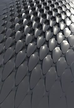 an abstract photo of the roof of a building with many rows of white circles on it