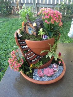 a potted planter filled with lots of plants