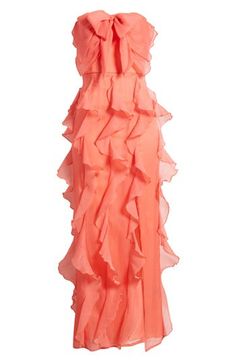 an orange dress with ruffles on it