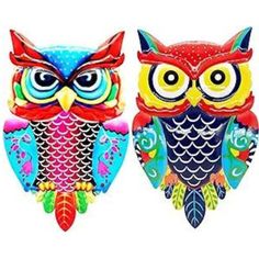 two colorful owls sitting next to each other