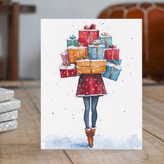 there is a card with a woman carrying presents on her back and two stacks of gifts in the background