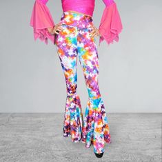 Funky and bold spandex bell bottoms in tie dye print. These bell bottoms will fit you perfectly. They hug your hips and flare out at the feet. The standard inseam is 34" but can be customized by putting your desired inseam in the comments/notes when checking out.  Please choose between low-rise, mid-rise, or high-waist. *Our model normally wears a size 4, with a 27" waist, 37" hips and is 5'5" tall. She is wearing a size small with a 34" inseam (and 3" heels) Women's Sizing (See below for instru Spring Pants With Stretch And Flared Hem, Retro Fitted Flares With Flared Hem, Hippie Wide Leg Flares For Spring, Hippie Wide Leg Spring Flares, Trendy Summer Flares With Flared Hem, Retro Spring Flares With Flared Hem, Trendy Summer Full-length Flares, Spring Hippie Wide Leg Flares, Trendy Flared Hem Summer Pants