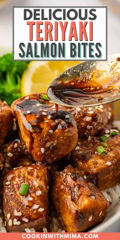 delicious teriyaki salmon bites on top of rice with sesame seeds and garnishes